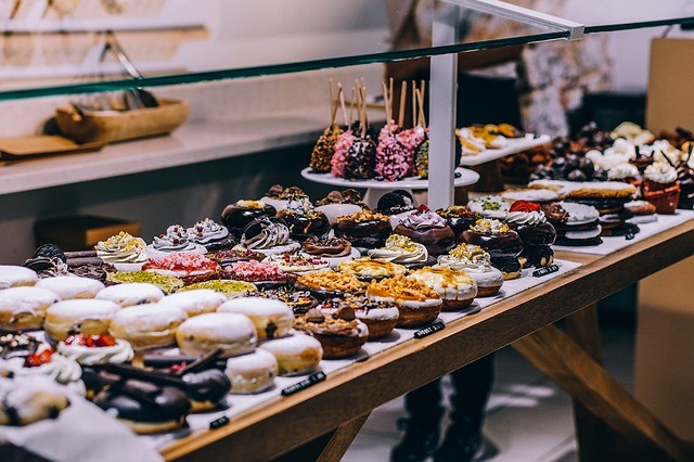 cravings cakes and doughnuts on table