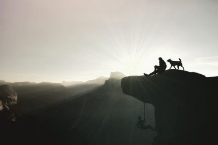 principles of resilience man with dog on mountain