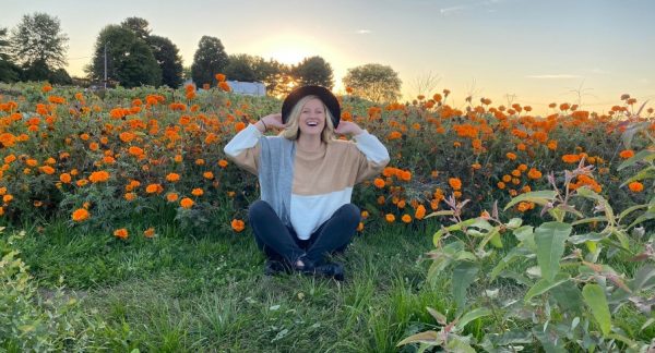 self-love girl in flower field