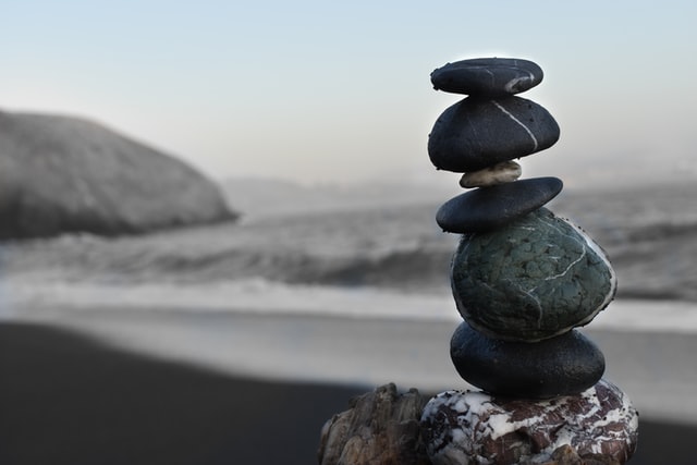 mindfulness rock tower on beach