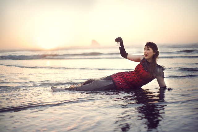 vintage woman in a dress in ocean