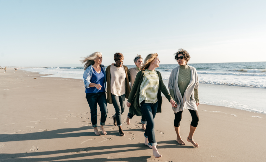 women walking on beach alcohol-related deaths in women