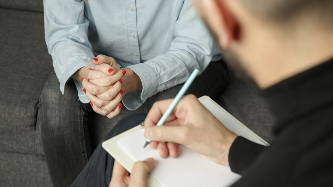 a therapist writes notes down while listening to a patient who just asked can anorexia cause diabetes